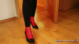 Crimson pantyhose, High stilettos & dark-hued stretch pants taunt