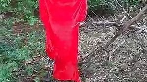 Thelady in her crimson cloak in the forest