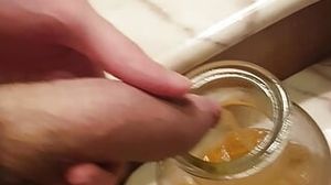 Urinating in a jar to showcase off all my golden yellow liquid (because one of you asked me to)