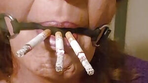 Ballgag Smoking three at once