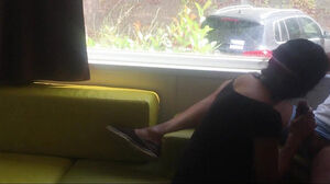Camping risky public oral in front of an open window