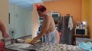 Nudist housekeeper Regina Noir cooking at the kitchen. Naked maid makes dumplings. part 2