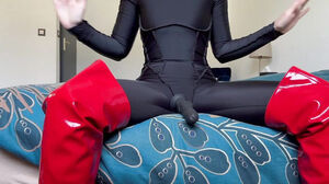 Tiny dominatrix in thigh-high shoes who guides your hand-job with insults and assfuck
