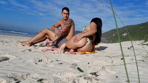 Steamy duo on the public beach