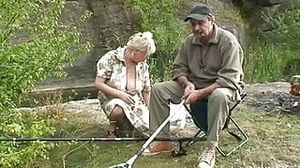 Two elderly people go fishing and find a young girl