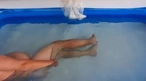 Outdoor pussy show. Nude couple plays in the outdoor nudist swimming pool. (Regina Noir) cam 2