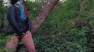 Milf in leather, mastrubates and cums on public forest trail