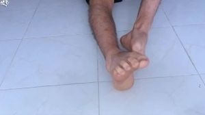 Delicious feet and furry chisel skimming the floor
