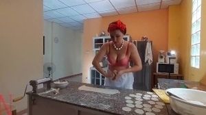 Nudist housekeeper Regina Noir cooking at the kitchen. Naked maid makes dumplings. Naked Part 1
