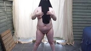Nude in Niqab in ankle boots