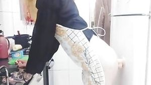 Sissy Aniya - ladyboy Housewife humping the fake penis While Washing Dishes