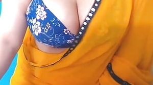Massive milk cans desi indian trisha bhabhi aka curybhabhi taunting with her massive booobs while dressed in yellow saree