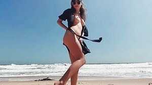 Teenie woman Public Masturbates on a bare Beach, kneads soles, and fellow jacks off hard-on and blows a load