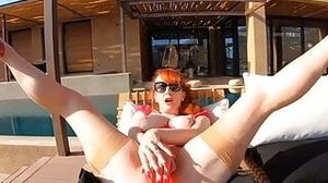 Big tit redhead mature Red XXX masturbates poolside
