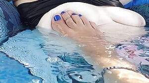 Fumbling my blue pedicured soles and toes all over her moist hooters whilst chilling in the pool