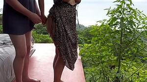 Exotic curvaceous Jungle woman in Leo sundress railing shaft point of sight sight