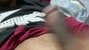 Masturbating