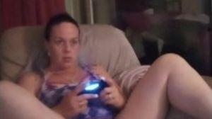 Filming Up Milf's Purple Mini micro-skirt While She Plays vid Games