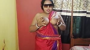 Indian warm mummy demonstrating her fleshy vag in crimson sharee