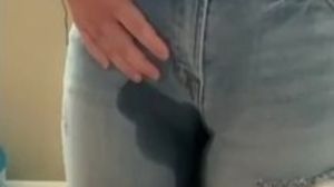 DESPERATE WETTING in tight jeans after holding 6 hours!