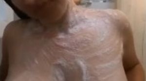Cougar in the douche washing udders then washing and pruning underarms, mature