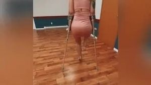 Amputee crutching in a high heel