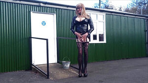 Crossdresser Gina urinating in vinyl