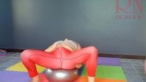 'A girl without panties is engaged in yoga. The athlete takes off yoga leotards and shows her pussy.'