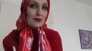 Female Victoria Valente showcased trendy Satin Headscarves with a crimson Cashmere Turtleneck Sweater